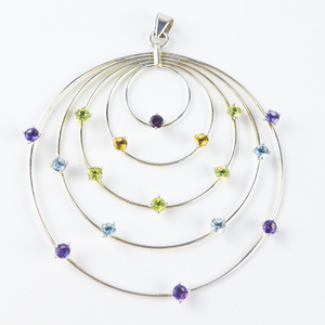 lot 85 image: Garnet, Citrine, Peridot, Aquamarine, Amethyst, Sterling Silver Circle Pendant (no chain).