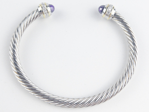 lot 265 image: Twisted Cable Style With Simulated Blue Topaz Stainless Steel Cuff Bracelet.