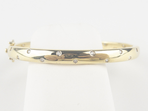 lot 266 image: Cz Accented Vermeil Hinged Bangle.
