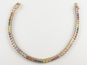 lot 270 image: Technibond Rainbow Of Created Sapphire Vermeil Tennis Bracelet.