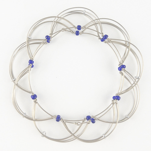 lot 274 image: Super Cool Wire & Bead Base Metal Figet Bracelet .