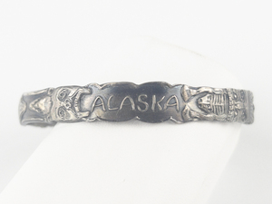 lot 283 image: Vintage Alaska Tribal Totem Sterling Silver Bangle.