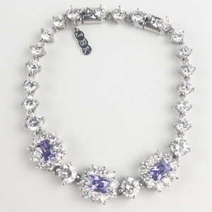 lot 290 image: Jacqueline Kennedy  Created Tanzanite & Cz Silver Tone Base Metal Tennis Bracelet.