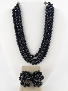 lot 214 image: Black Faceted Silver Tone Base Metal Multi-Strand Bead Necklace & Clip-On Earrings.