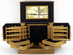 lot 9 image: Lori Greiner  JEWELRY Storage Cabinet For Your Ease Only Vintage Multi-Compartment Jewelry Cabinet in Elegant Honey Oak & Gold.