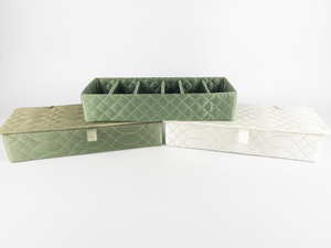 lot 44 image: Group of Three Vintage Green, White & Gold Fabric Storage Boxes