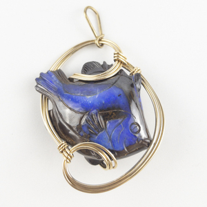 lot 10 image: LARGE Boulder Opal Carved Fish Wrapped in gold plated wire pendant (no chain).
