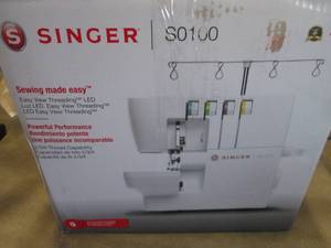 lot 77 image: SINGER S0100 Serger open box Retail...