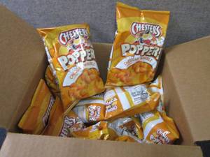 lot 276 image: 12- 2 oz Chesters Cheddar Whirlz P...