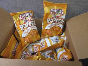 lot 277 image: 12- 2 oz Chesters Cheddar Whirlz P...