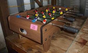 lot 16 image: Very cute table top foosball table