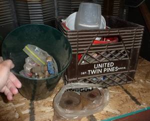 lot 21 image: Misc items - cast iron wheels, brass fittings, crate and pails