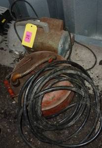 lot 28 image: gas can, air hose, motorpump