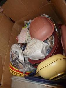 lot 52 image: Box full of kitchen supplies, tupperware, crock pot, cake pan