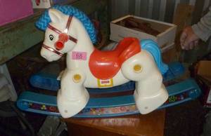 lot 68 image: Fisher Price ride on rocking horse