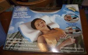 lot 70 image: Contour pillow, size 12 shoes, Netgear router, shower organizer, bathroom scale, rags, shims, cosmetics, notepad keyboard, multiple boxes