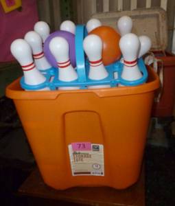lot 73 image: Tote full of misc, bowling game, and cooler full of sandbox toys