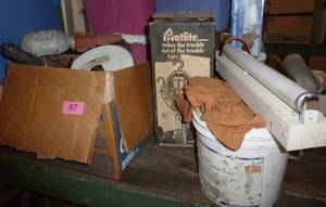 lot 87 image: Box full of garage items, trouble lights, reel, rags