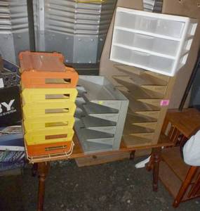 lot 98 image: Table with a bunch of organizers plastic and steel