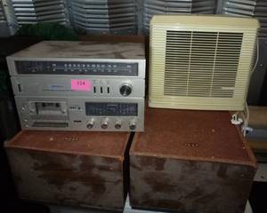 lot 114 image: Stereo system with 2 speakers and an air ionizer