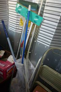 lot 141 image: lot of mops, brooms, step stool, garden waterer, box of dcor