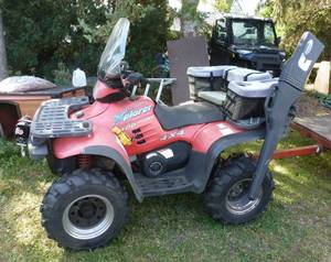 lot 3 image: 1995 POLARIS Explorer 400 4x4 ATV with 5 ft snow blade