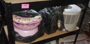 lot 168 image: garage shelf unit and hepa filter and potty trainer