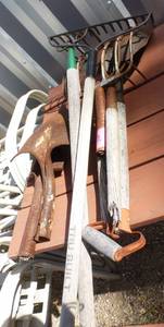 lot 194 image: Rake plus a group of shovels and pitchforks that need new handles