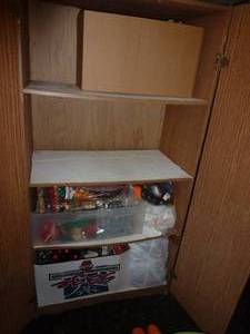 lot 197 image: Contents of cabinet - xmas, kids stuff, giant frog