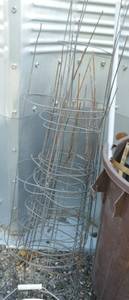 lot 230 image: boat anchor and tomato cages