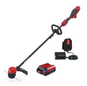 lot 14 image: TORO 60V MAX 13 in. (33.0 cm)  15 in. (38.1 cm) Brushless String Trimmer with 2.0Ah Battery and Charger