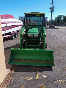 lot 3 image: John Deere 300X Loader with attachments
