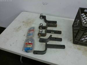 lot 46 image: Lot of Trailer Hitches, Chains, and Accessories