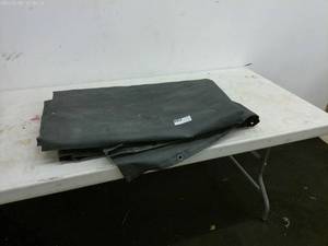 lot 75 image: Heavy Duty Black Tarp with Grommets