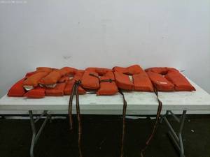 lot 110 image: Lot of 10 Orange Life Jackets