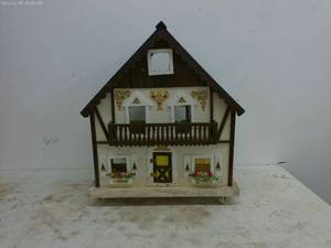 lot 155 image: Vintage Dollhouse with Unique Design and Decor