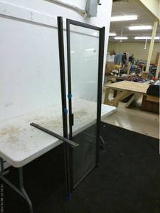 lot 211 image: Metal Frame Glass Door Panel