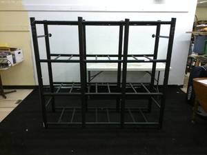 lot 245 image: Black tub storage shelf