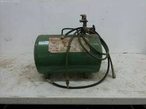 lot 283 image: Vintage Green Air Compressor Tank with Hose and Pressure Gauge