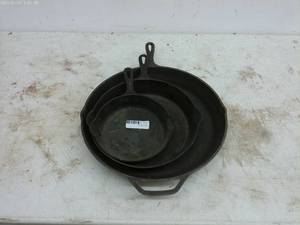 lot 329 image: Vintage Griswold (2) and Lodge (1) Cast Iron Skillets