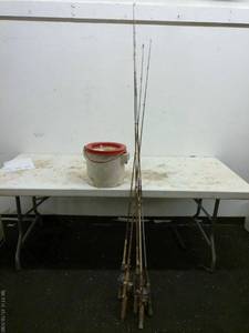 lot 354 image: Lot of Vintage Fishing Rods with Storage Bucket