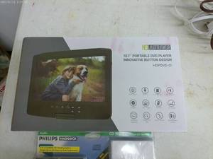lot 396 image: Portable DVD Player with CD Cleaning Kit Bundle