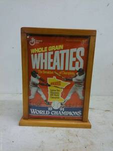 lot 492 image: Framed 1991 Wheaties Box with Autograph - Minnesota World Champions