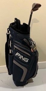 Ping Golf Bag with 2 Taylor Made Golf Clubs