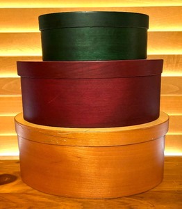 lot 55 image: Set of Three Bent Wood Nesting Boxes  Set of Three Nesting Shaker Boxes