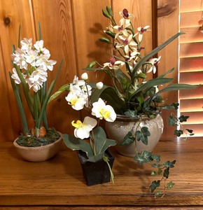 lot 69 image: Three Lovely Faux Florals