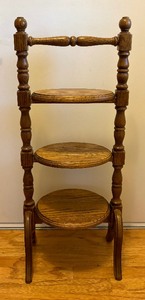 lot 110 image: Vintage Four Tiered Wooden Cake Stand