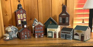 lot 177 image: Wooden Village Building Figurines