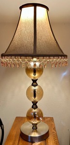 lot 247 image: Stacked Glass Sphere Lamp with Beaded Shade