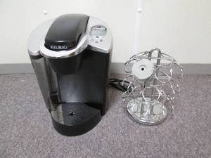 lot 63 image: Keurig machine and pod holder...